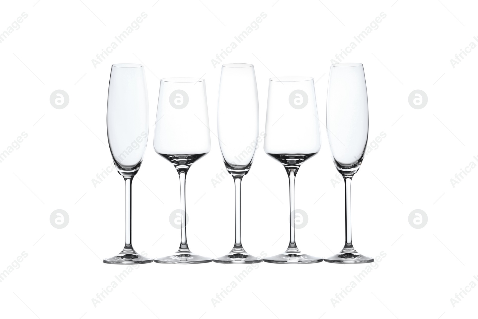 Photo of Set of different glasses isolated on white