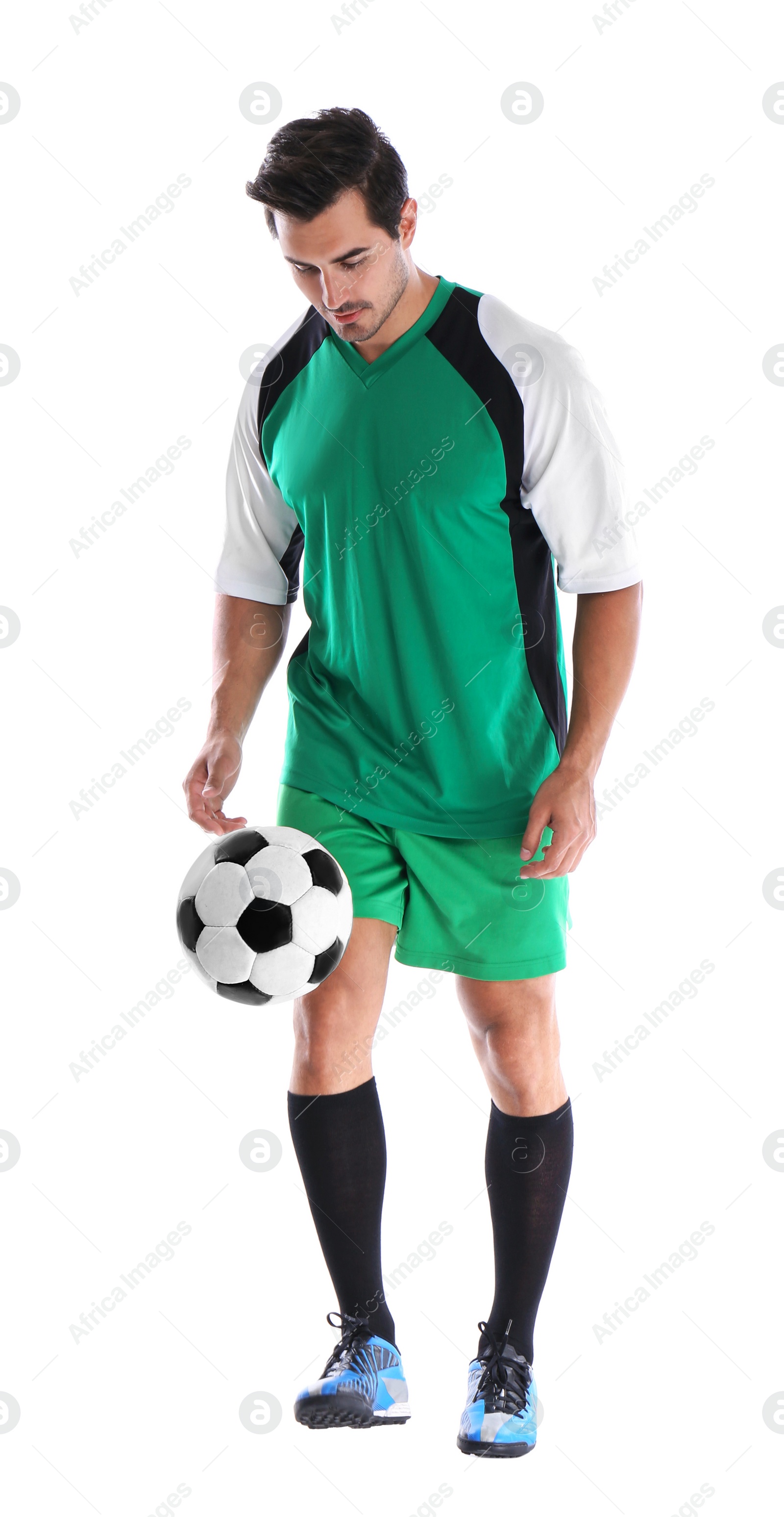 Photo of Young man playing football on white background