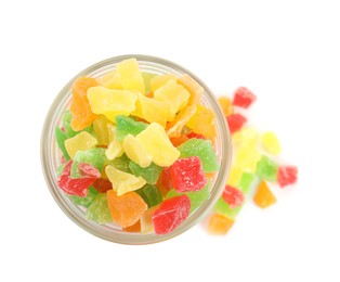 Mix of delicious candied fruits in jar on white background, top view