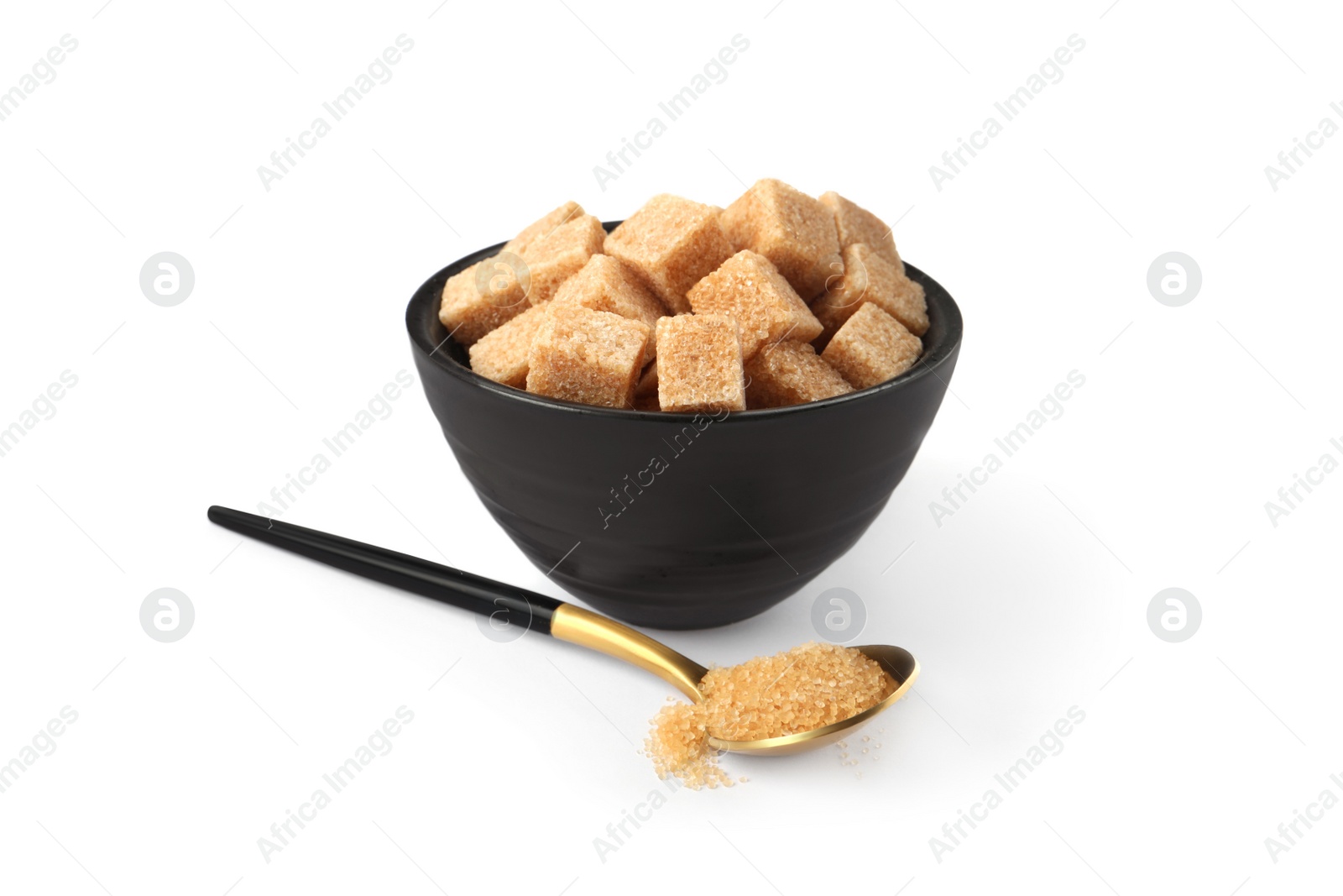 Photo of Granulated and cubed brown sugar with bowl on white background