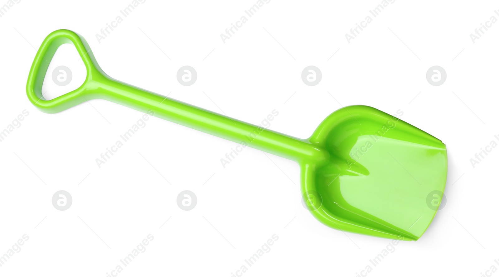Photo of Green plastic toy shovel isolated on white, top view