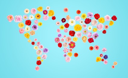 Image of World map made of beautiful flowers on light blue background, banner design