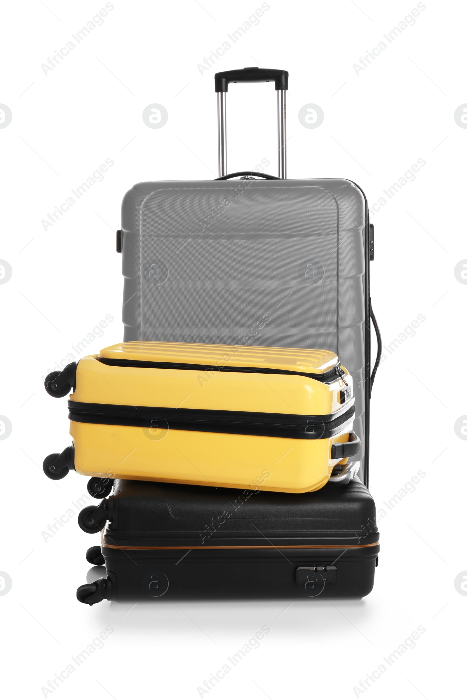 Photo of Modern suitcases for travelling on white background