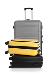 Photo of Modern suitcases for travelling on white background