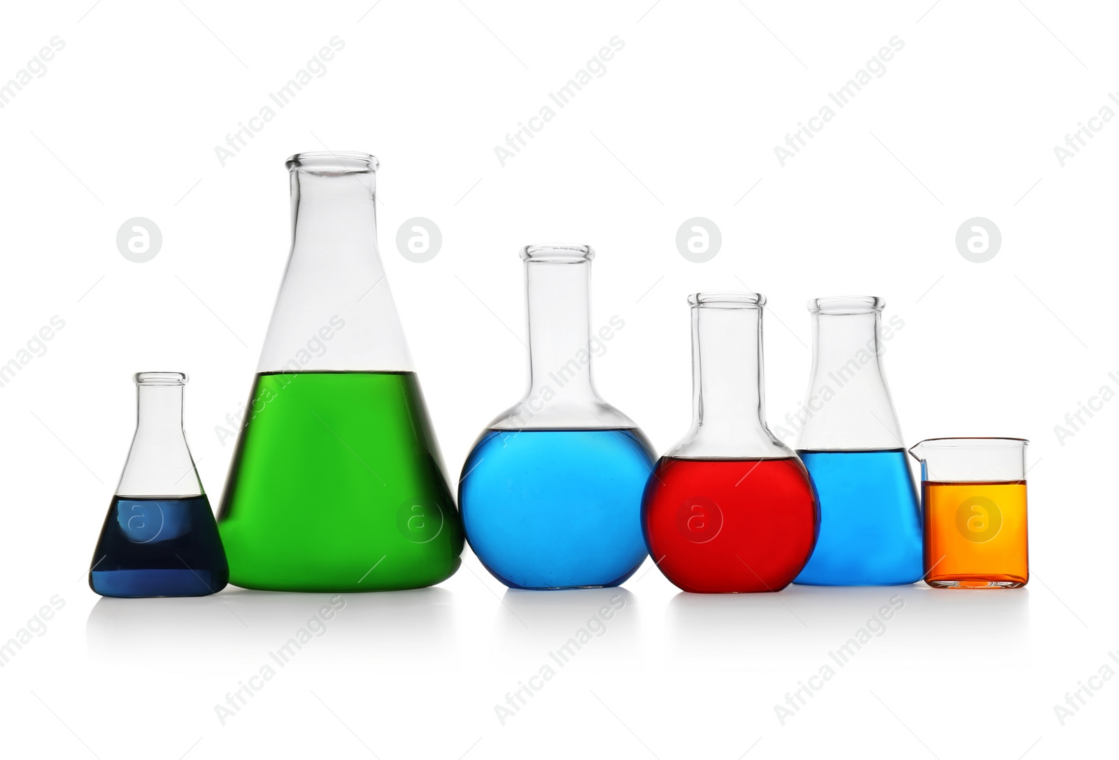 Photo of Chemistry glassware with color samples isolated on white