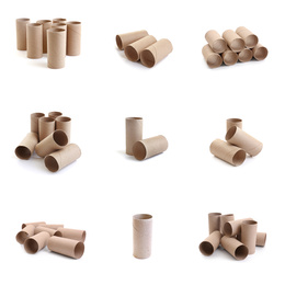 Image of Set with empty paper toilet rolls on white background