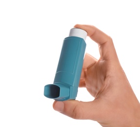 Photo of Man holding asthma inhaler on white background, closeup