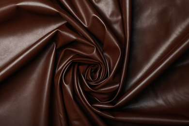 Piece of crumpled leather as background, top view