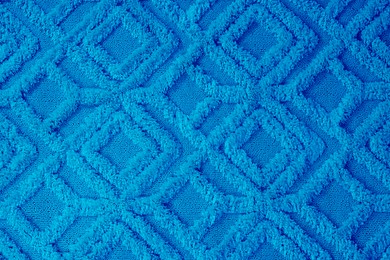 Image of Soft light blue carpet with pattern as background, top view