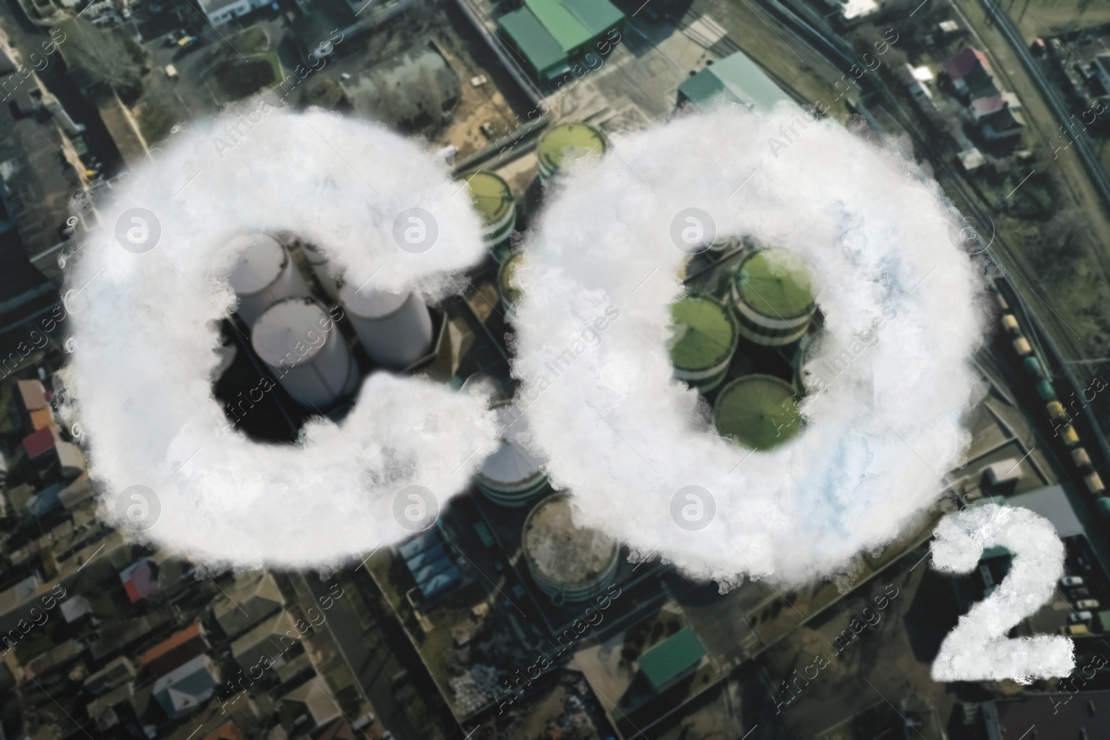 Image of Inscription CO2 made of smoke. Aerial view of industrial factory  
