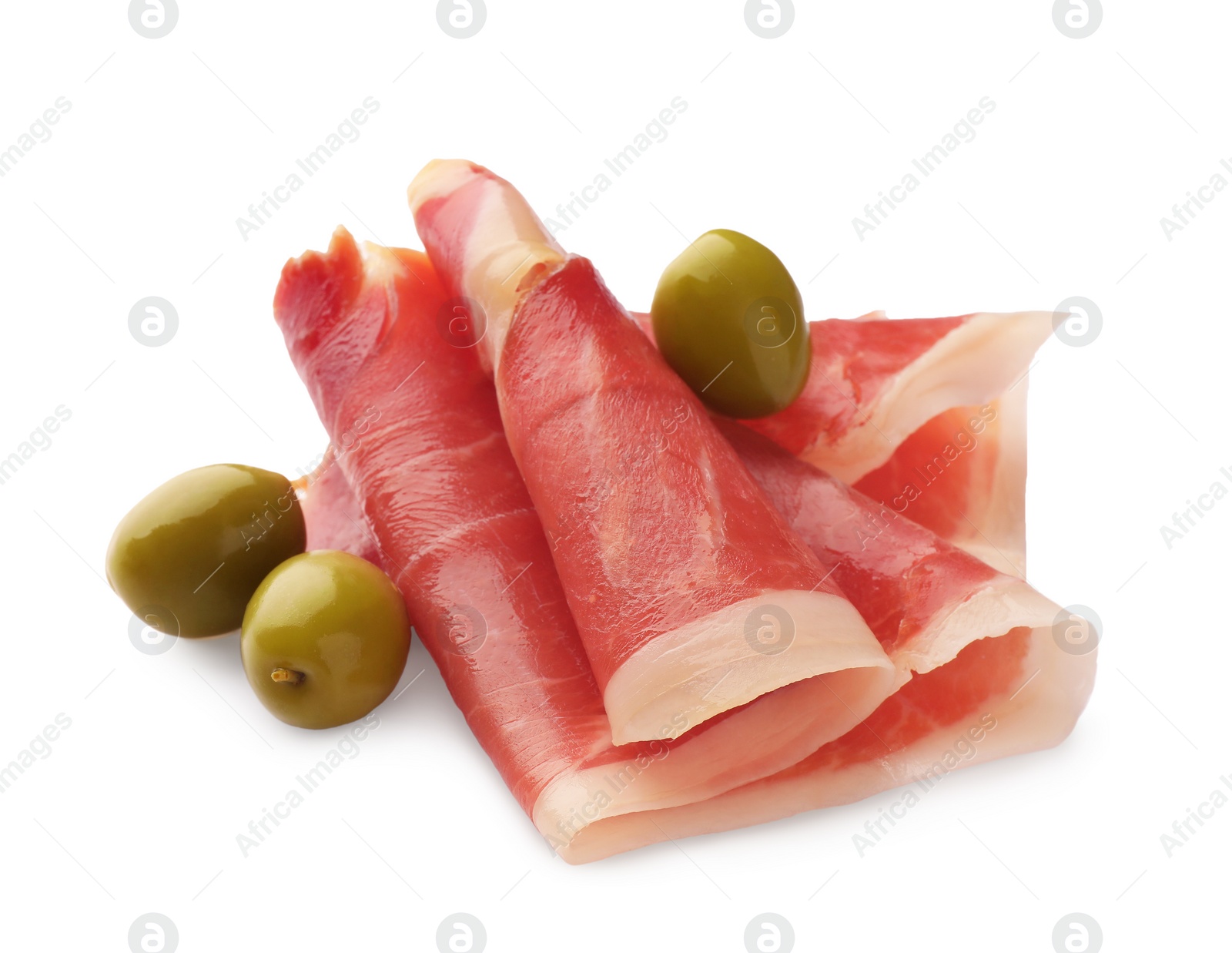 Photo of Delicious sliced jamon with olives on white background