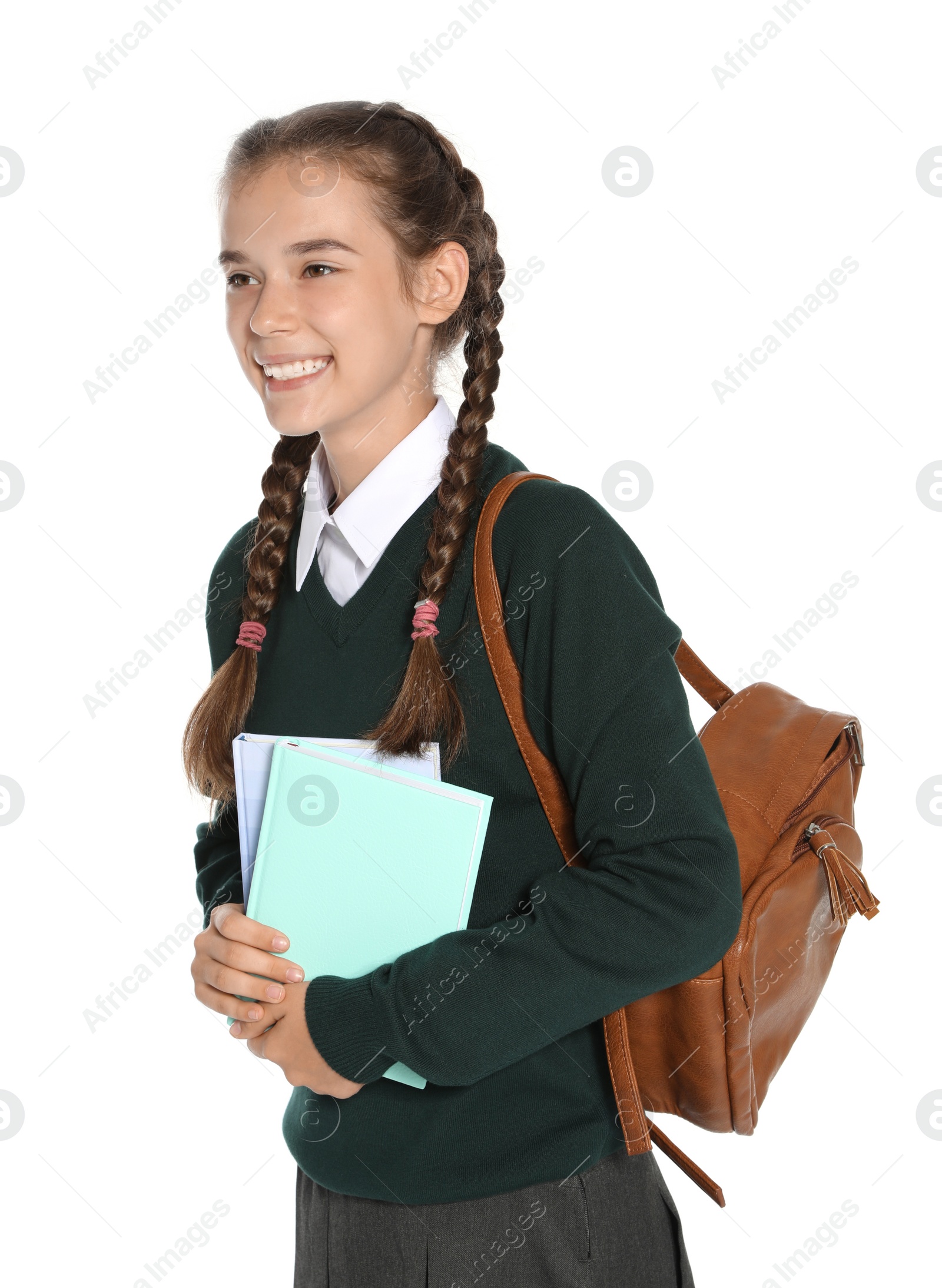 Photo of Teenage girl in stylish school uniform on white background