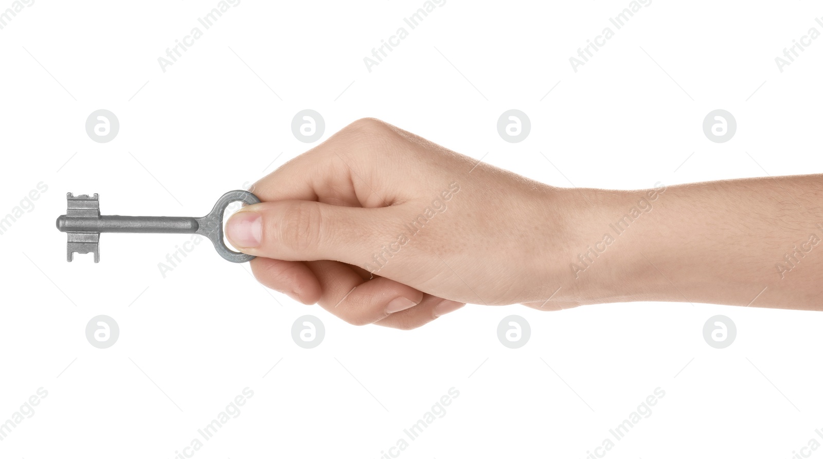 Photo of Woman holding silver vintage ornate key on white background, closeup