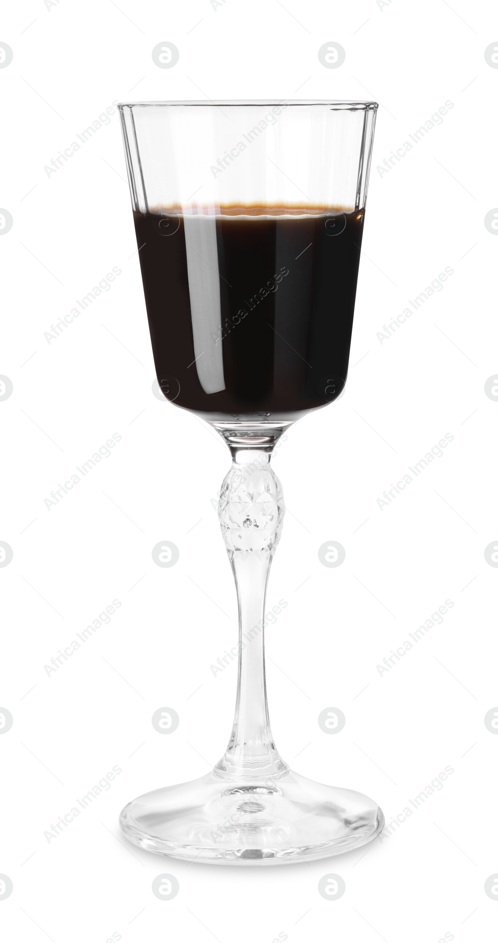 Photo of Shot glass with coffee liqueur isolated on white