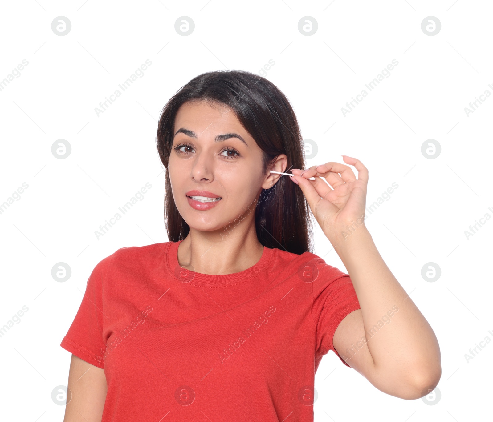 Photo of Young woman cleaning ear with cotton swab on white background