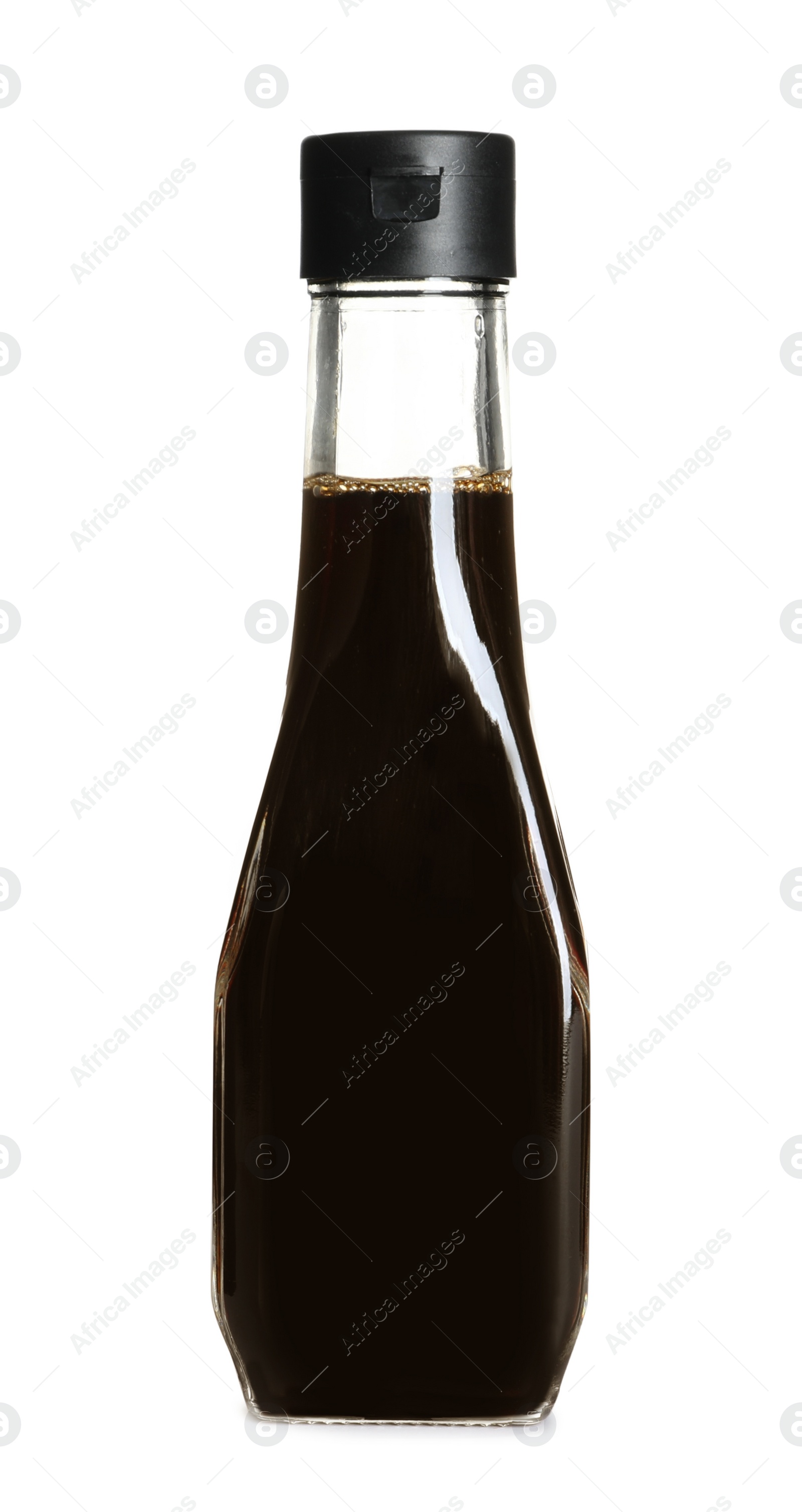 Photo of Traditional soy sauce in glass bottle on white background