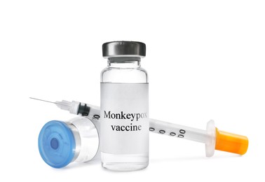 Monkeypox vaccine in vials and syringe on white background