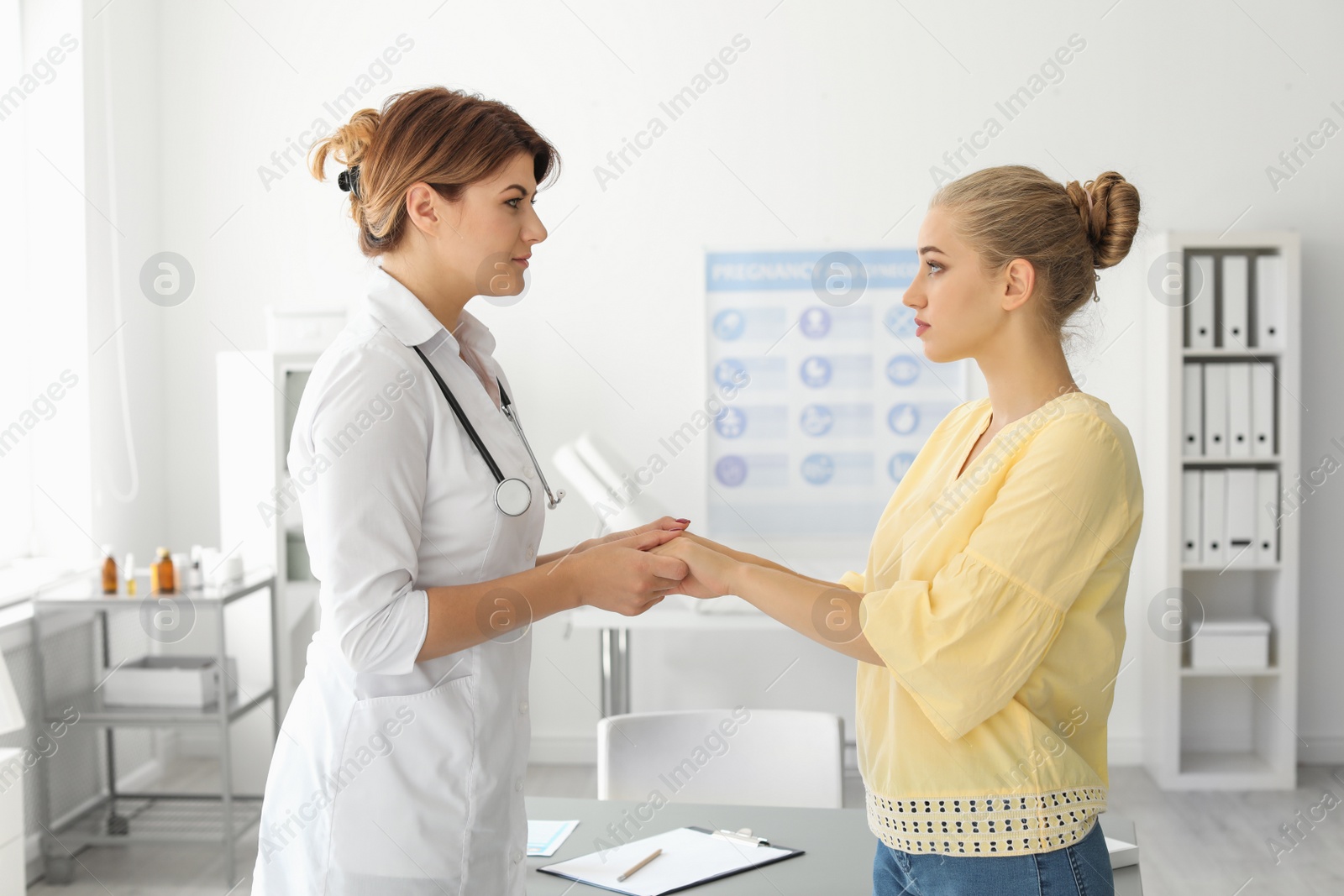 Photo of Patient having appointment with doctor in hospital