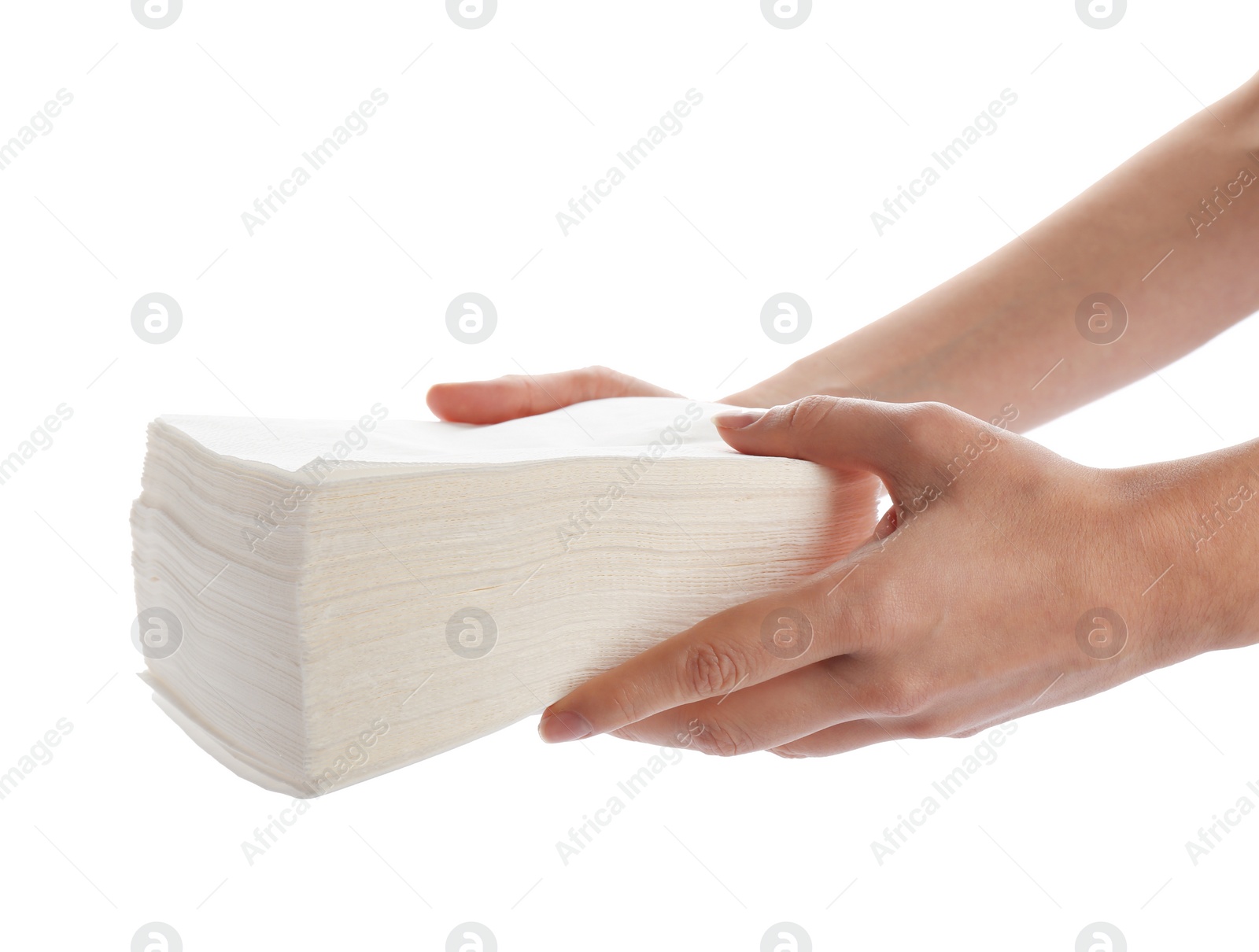 Photo of Woman holding stack of paper napkins on white background, closeup