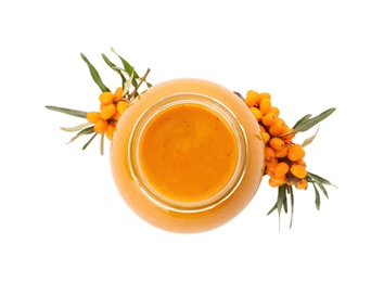 Delicious sea buckthorn jam in jar and fresh berries on white background, top view