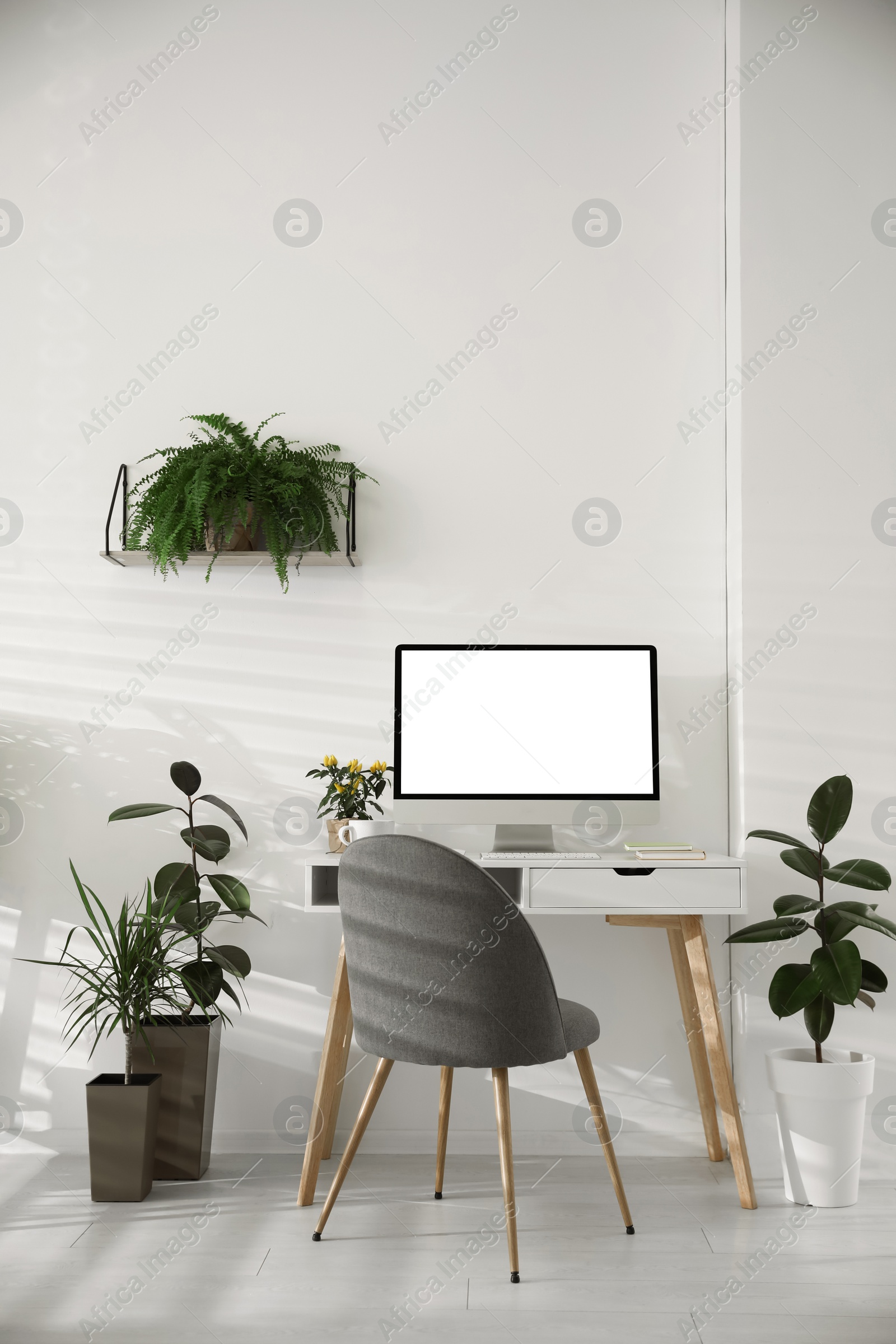 Image of Home workplace with modern computer and desk in room. Mockup for design