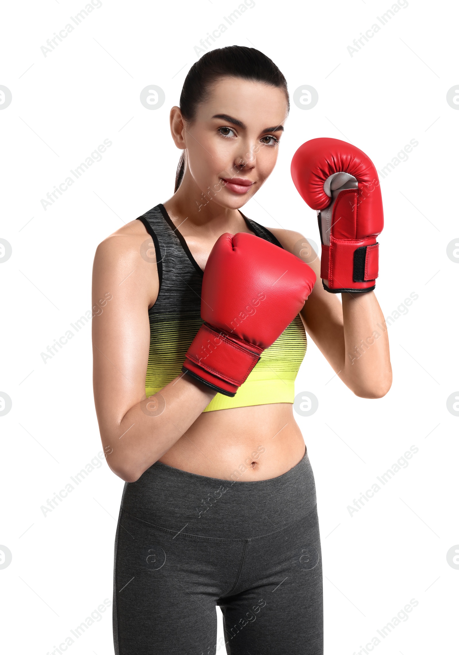 Photo of Beautiful woman in boxing gloves on white background