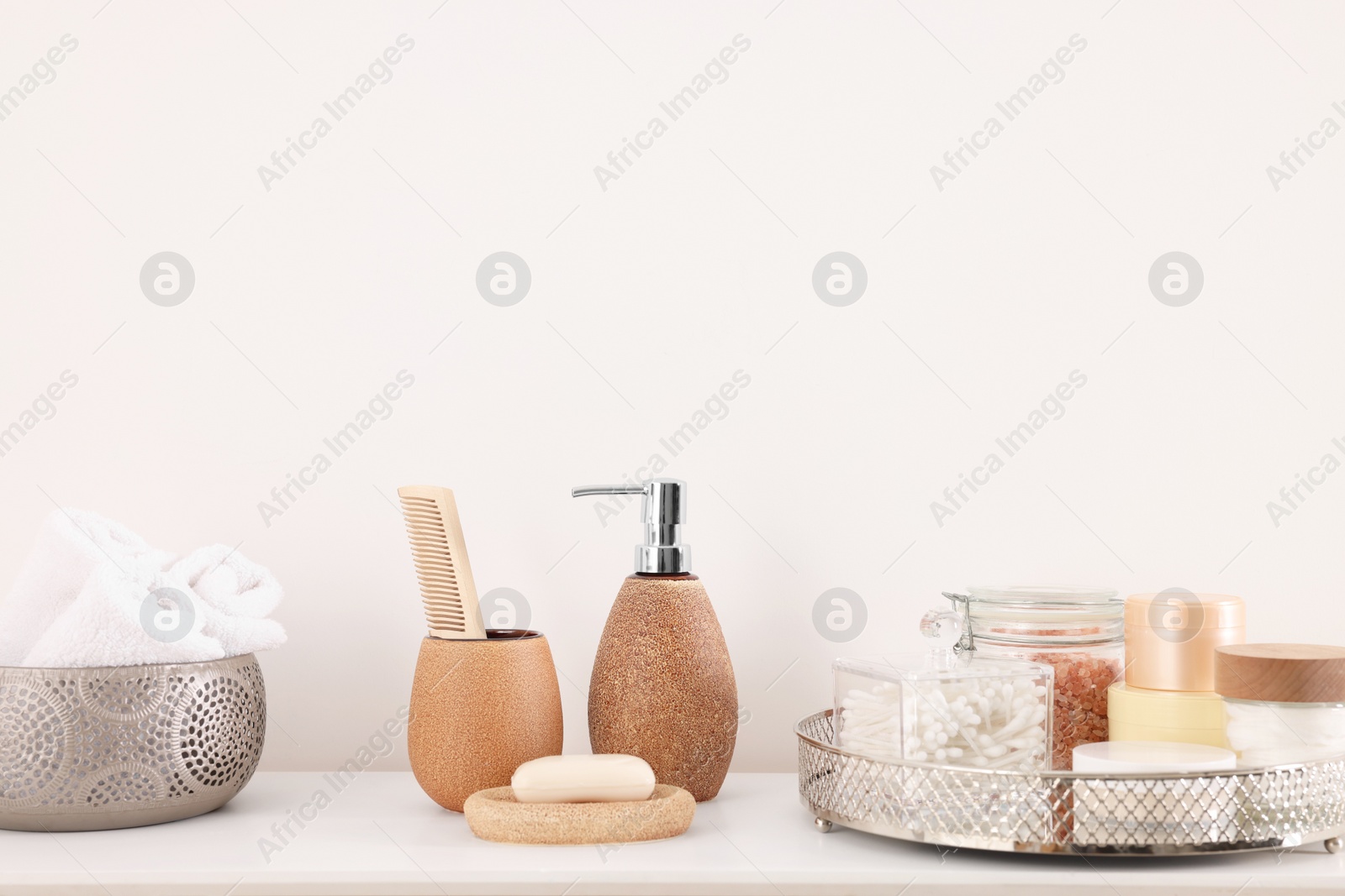 Photo of Different bath accessories and personal care products on white table