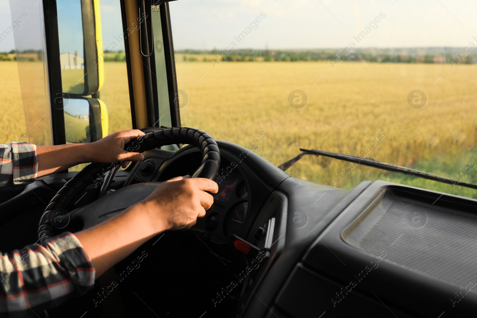 Photo of Man driving modern truck on sunny day, closeup