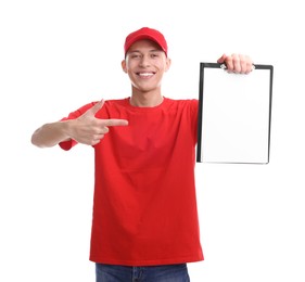 Photo of Happy courier pointing at clipboard on white background