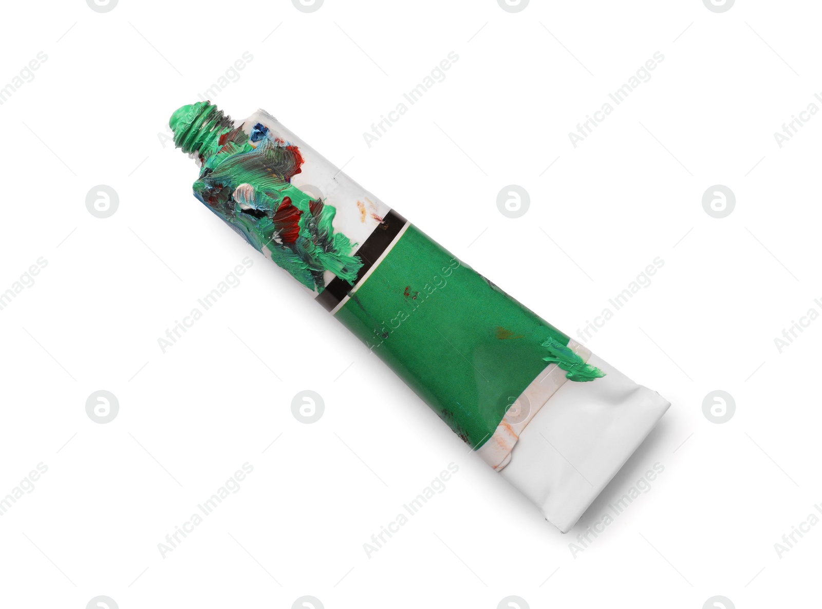 Photo of Tube with oil paint on white background, top view