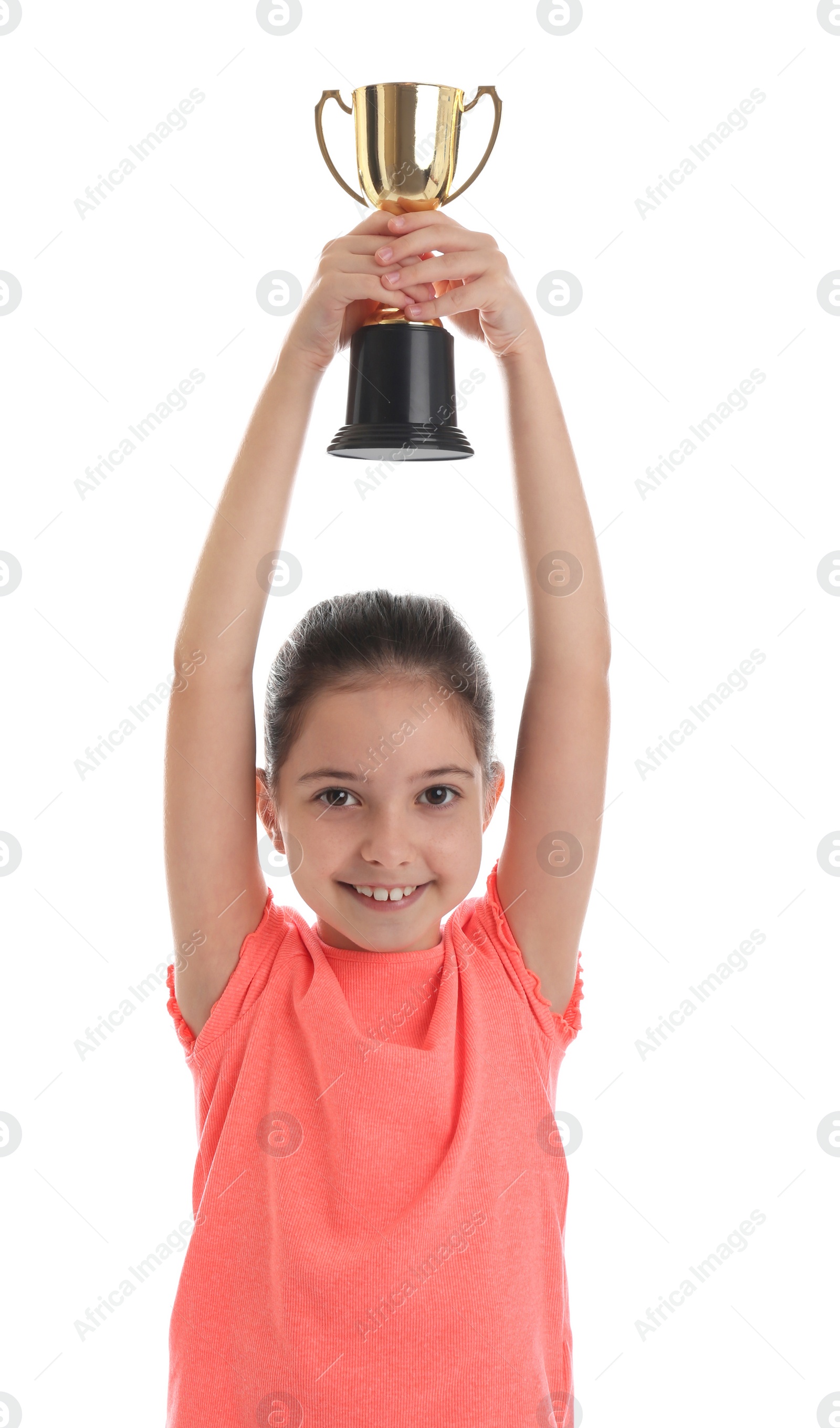 Photo of Happy girl with golden winning cup isolated on white