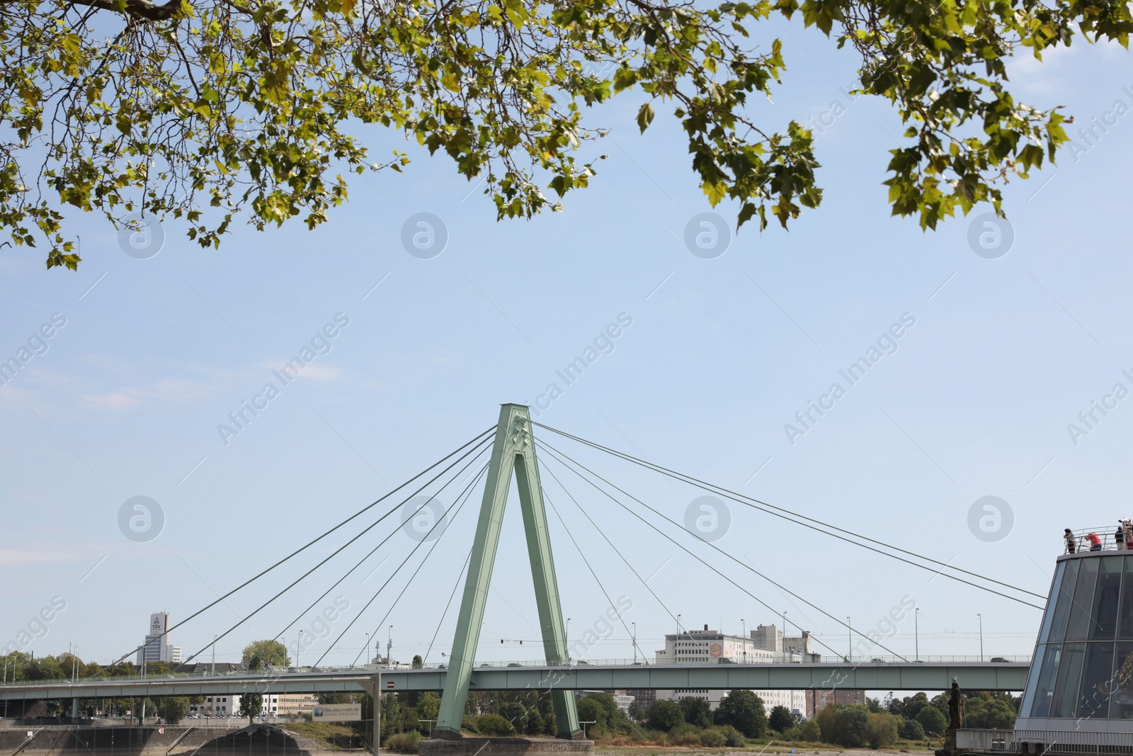 Photo of Cologne, Germany - August 28, 2022: Picturesque view of a modern bridge over river