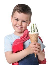 Adorable little boy with delicious ice cream on white background