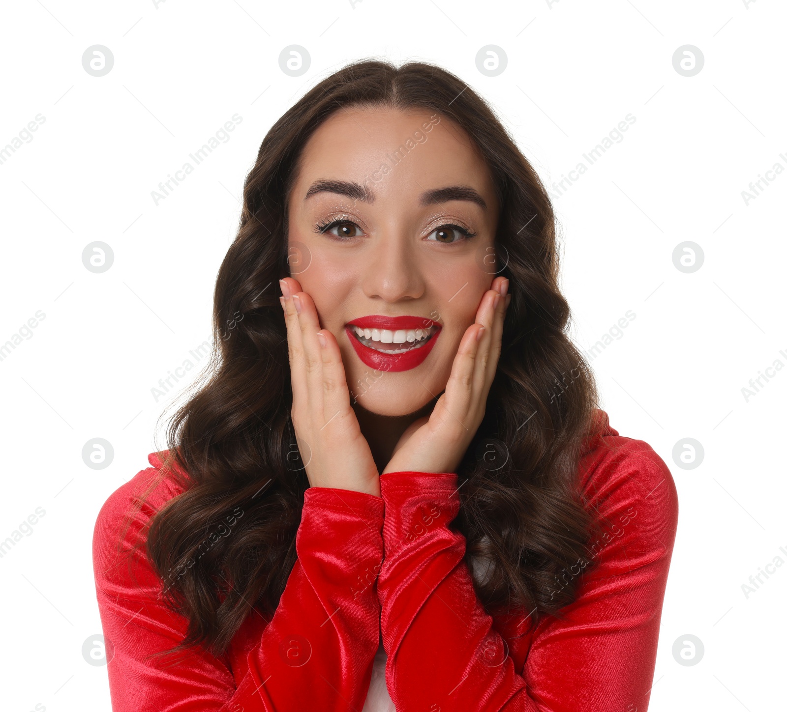 Photo of Christmas celebration. Beautiful young woman in red dress isolated on white