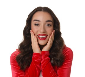 Christmas celebration. Beautiful young woman in red dress isolated on white