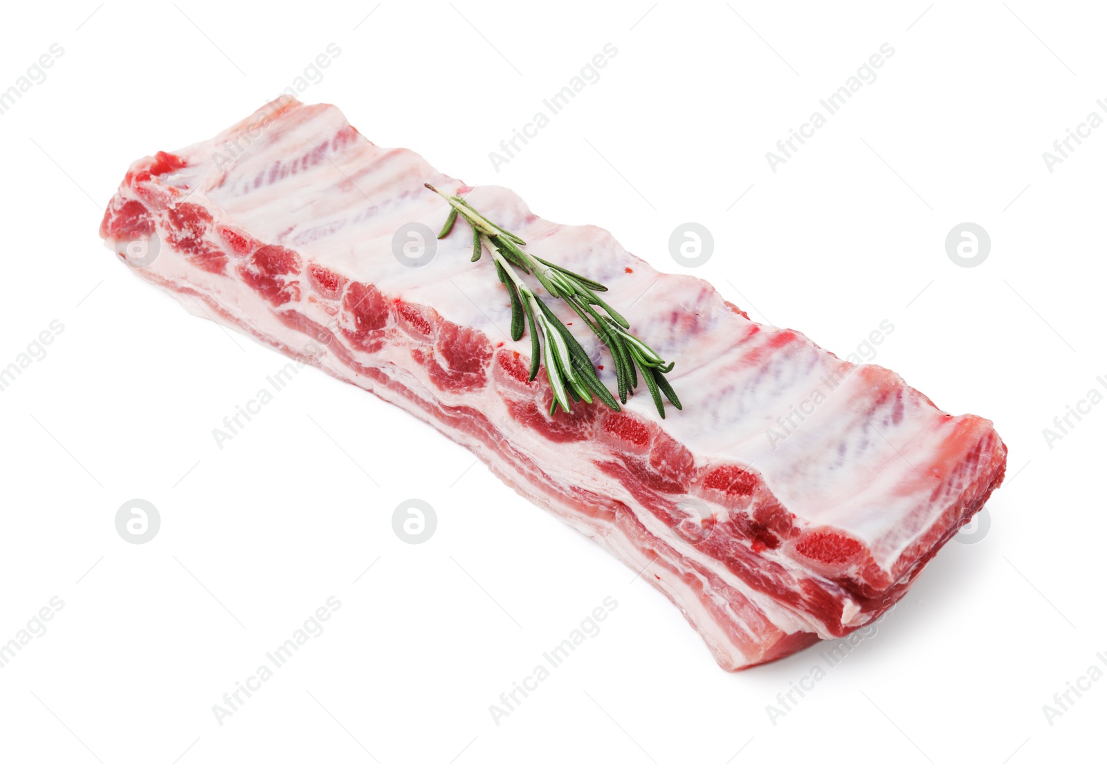 Photo of Raw pork ribs with rosemary isolated on white