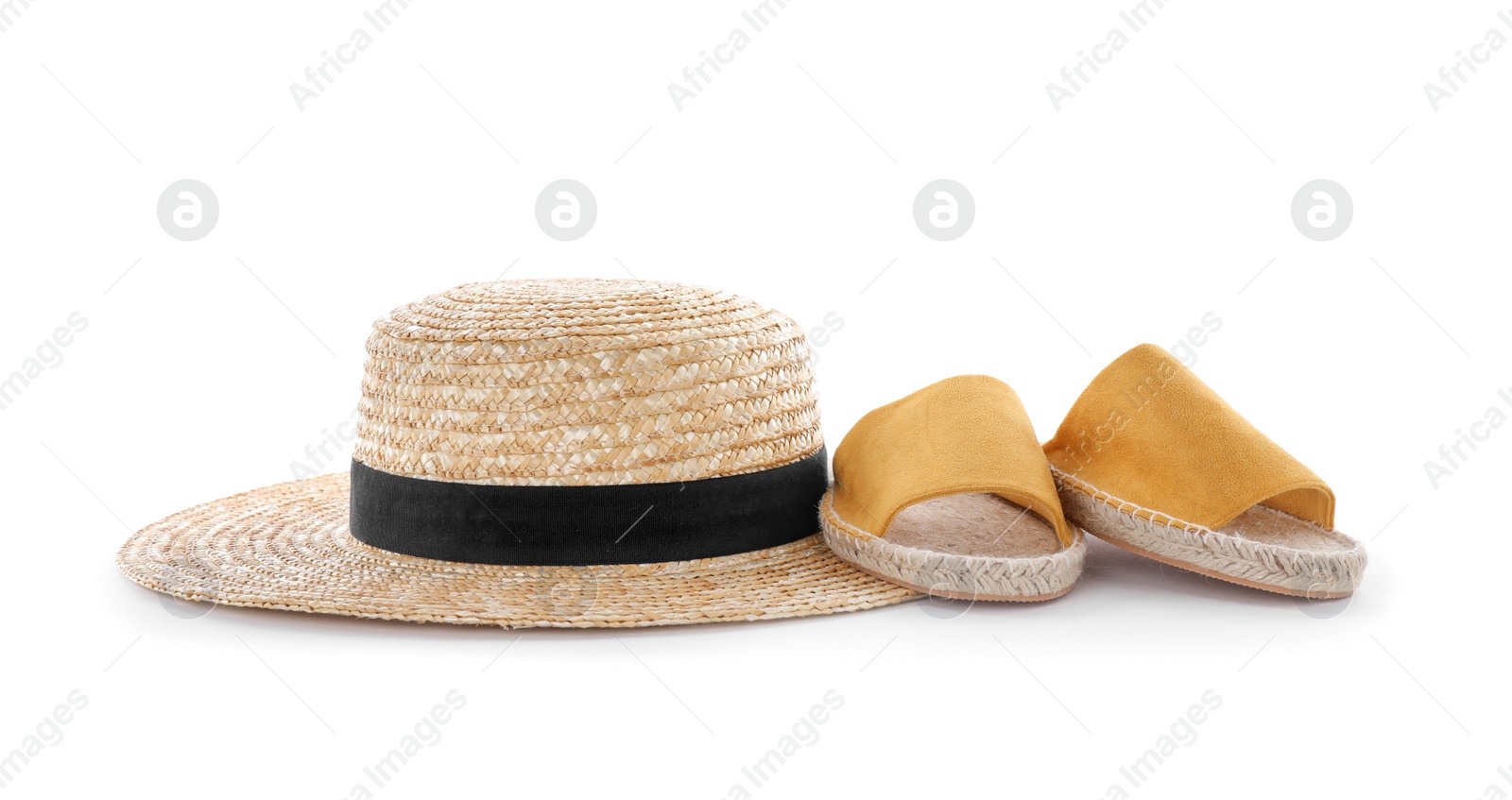 Photo of Hat and shoes on white background. Beach objects