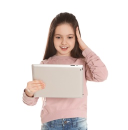 Photo of Little girl using video chat on tablet against white background