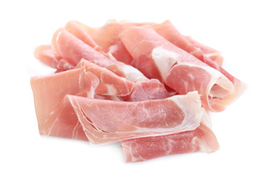 Slices of tasty prosciutto on white background