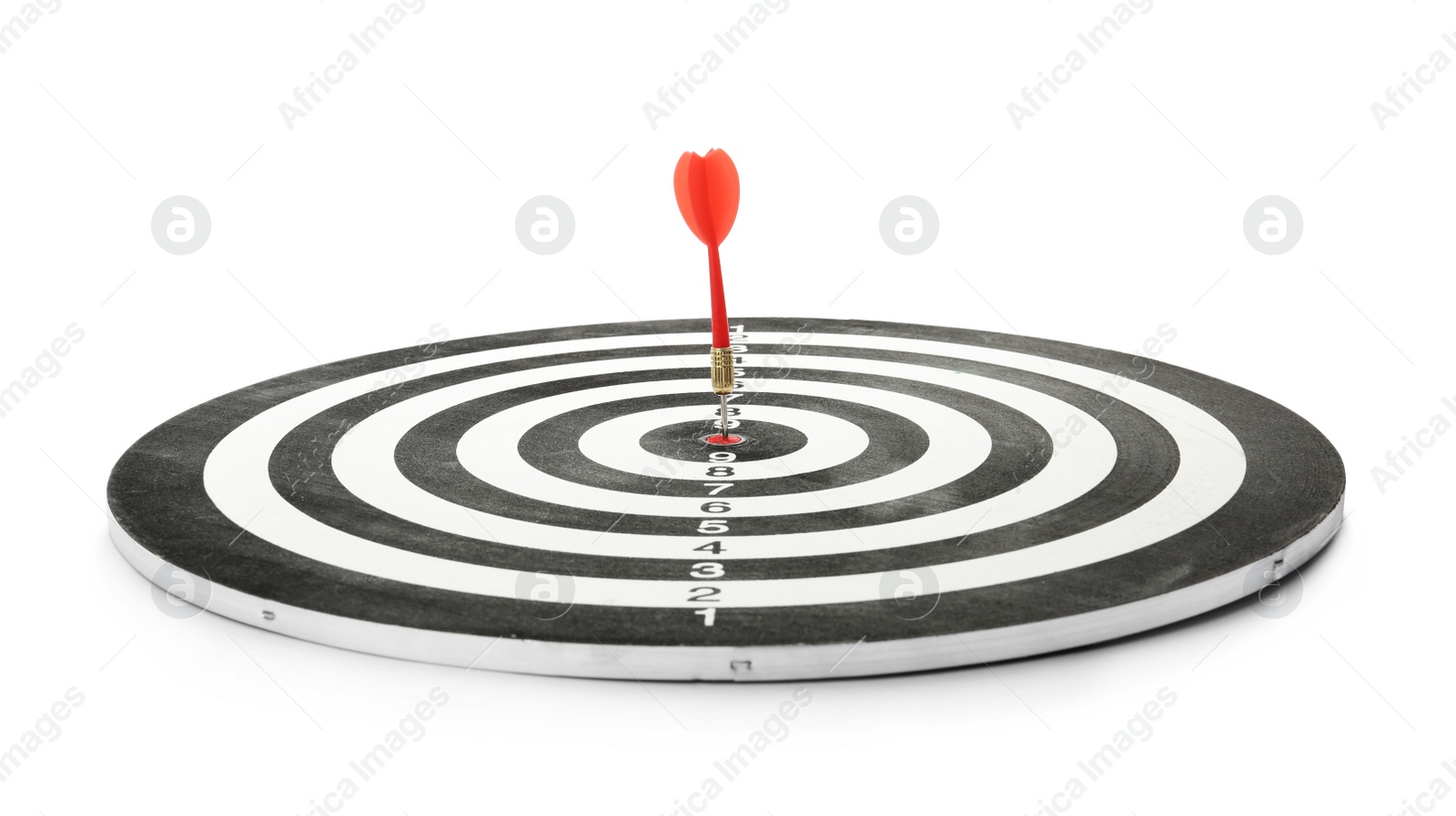 Photo of Red arrow hitting target on dart board against white background