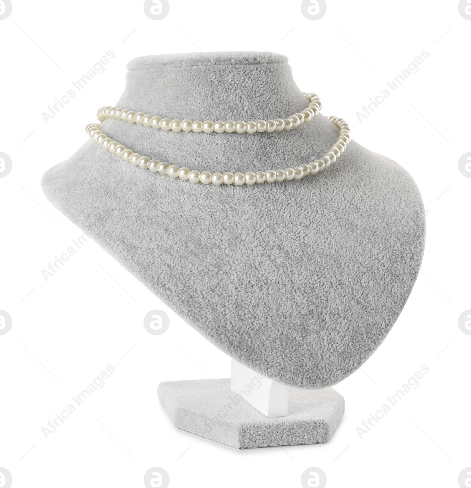 Photo of Stylish pearl necklace on jewelry bust against white background