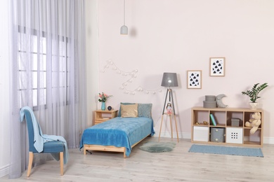 Photo of Child room with modern furniture. Idea for interior decor