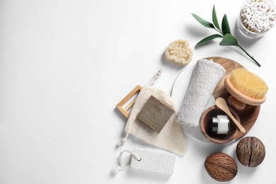 Bath accessories. Flat lay composition with personal care products on white background, space for text