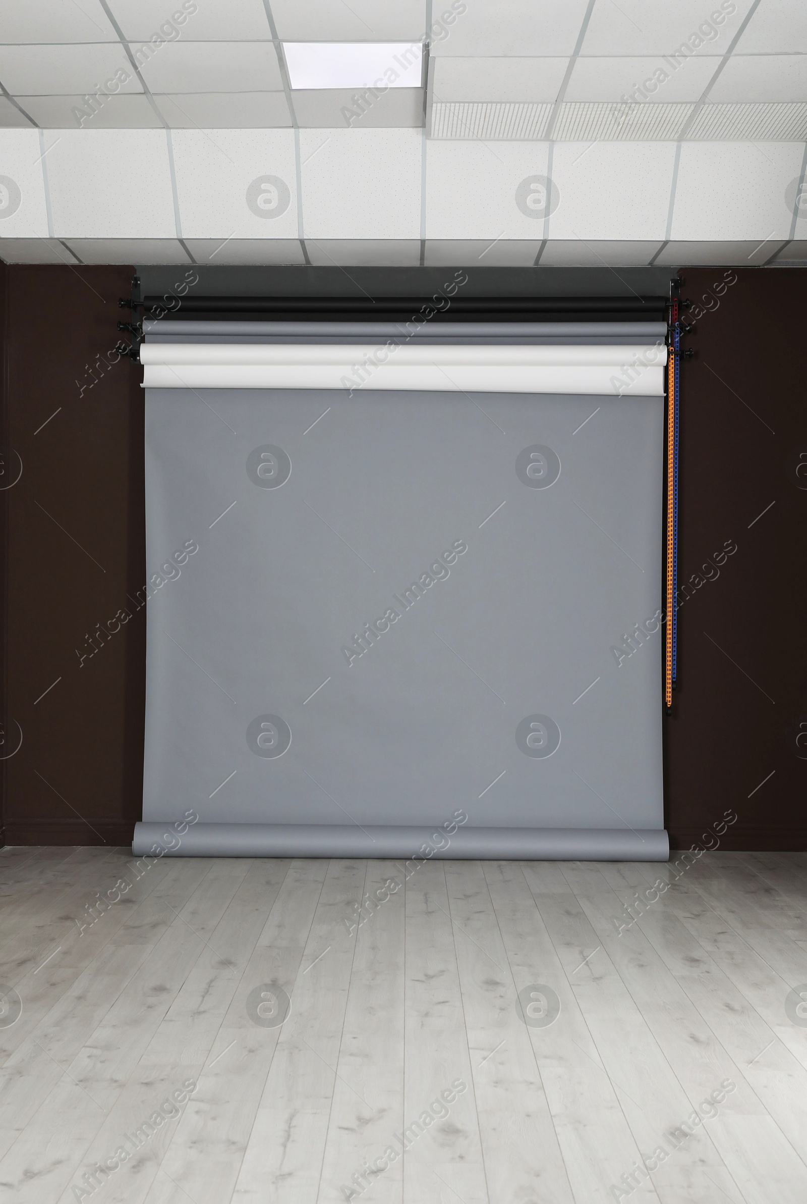 Photo of Empty grey photo background. Professional studio equipment