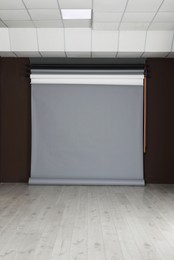 Photo of Empty grey photo background. Professional studio equipment