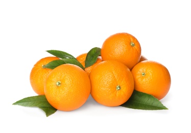 Fresh ripe oranges with green leaves on white background