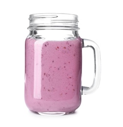 Photo of Mason jar with blackberry yogurt smoothie on white background