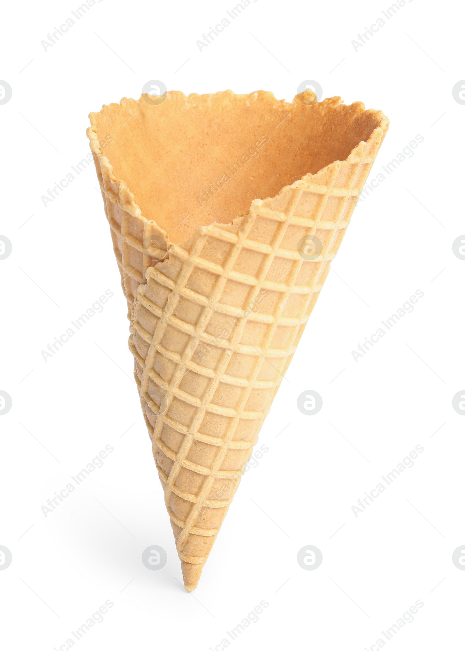 Photo of Empty wafer ice cream cone on white background