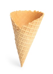 Photo of Empty wafer ice cream cone on white background