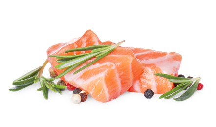 Photo of Pieces of fresh raw salmon and spices on white background